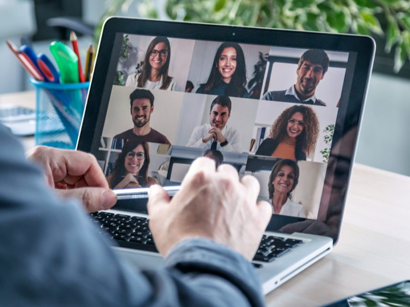 Man is on video with 9 members